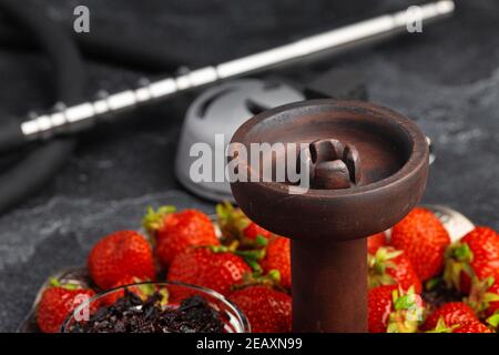 Empty hookah shaft close up on table with fresh fruit Stock Photo
