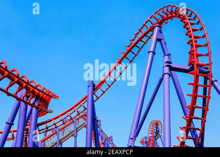 close-up image of a rollercoaster track and the blue sky Stock Photo