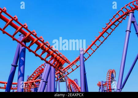 close-up image of a rollercoaster track and the blue sky Stock Photo