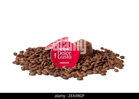 January 2021,Milan, Italy Set of Nescafe Dolce Gusto coffee capsules isolated on white background Top view Flat lay Drink obtained from dosed capsule Stock Photo