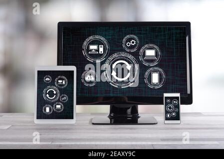 System update concept shown on different information technology devices Stock Photo