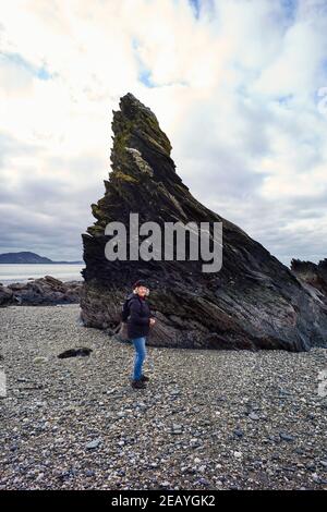 Poet and filmaker Janet Lees on Whitestrand Beach, Niarbyl, Isle of Man Stock Photo