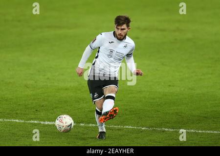 Swansea, UK. 10th Feb, 2021. Ryan Manning of Swansea City in action. The Emirates FA Cup, 5th round match, Swansea city v Manchester City at the Liberty Stadium in Swansea, South Wales on Wednesday 10th February 2021. this image may only be used for Editorial purposes. Editorial use only, license required for commercial use. No use in betting, games or a single club/league/player publications. pic by Andrew Orchard/Andrew Orchard sports photography/Ģ����ý Live news Credit: Andrew Orchard sports photography/Ģ����ý Live News Stock Photo