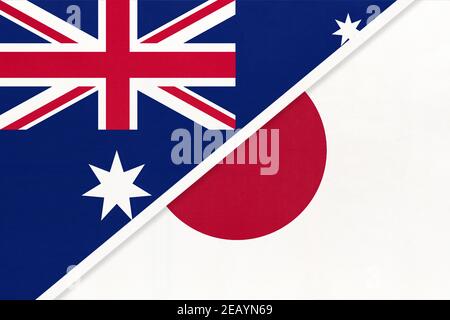 Australia and Japan, national flags from textile. Relationship, partnership and match between two countries. Stock Photo