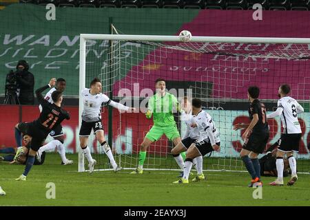 Swansea, UK. 10th Feb, 2021. Ferran Torres of Manchester City (21) shoots over the crossbar. The Emirates FA Cup, 5th round match, Swansea city v Manchester City at the Liberty Stadium in Swansea, South Wales on Wednesday 10th February 2021. this image may only be used for Editorial purposes. Editorial use only, license required for commercial use. No use in betting, games or a single club/league/player publications. pic by Andrew Orchard/Andrew Orchard sports photography/Alamy Live news Credit: Andrew Orchard sports photography/Alamy Live News Stock Photo