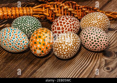 Happy Easter.Colorful hand painted decorated Easter eggs, willow branches. Handmade Easter eggs on wooden table.Spring decoration background. Festive Stock Photo