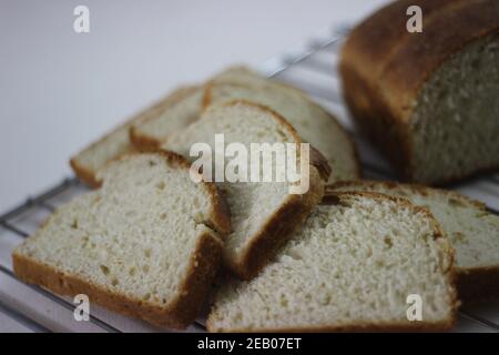 Home baked mini roll loaf bread with broken bands of rolls visible Stock Photo