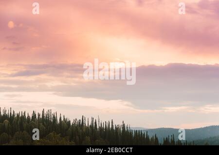 Panoramic view of pink clouds in sunset sky Stock Photo