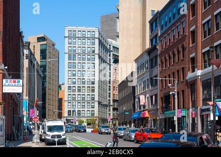 Historic commercial buildings on Harrison Avenue at Beach Street in Chinatown in downtown Boston, Massachusetts MA, USA. Stock Photo