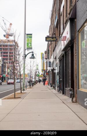 Downtown Bloor street in Toronto is near-empty due to new COVID-19 stay-at-home orders. Stock Photo