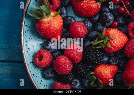 Mix of fresh RAW berries fruits for healthy eating Stock Photo