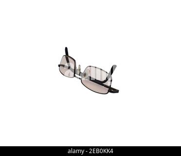 Prescription glasses with a metal frame and folded handles. Isolated on white background Stock Photo