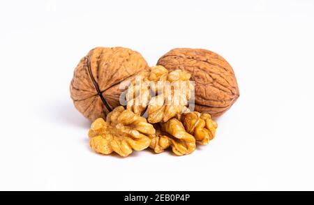 walnut and a cracked walnut isolated on the white background Stock Photo