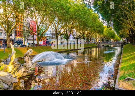 DUSSELDORF, GERMANY, AUGUST 10, 2018: View of the triton fountain in Dusseldorf, Germany Stock Photo