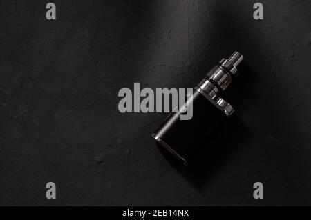 Top view of a vape box isolated on the dark surface Stock Photo