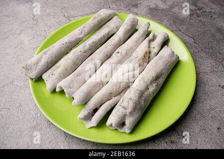 Til pitha a traditional food of Assam  isolated stock image. Stock Photo