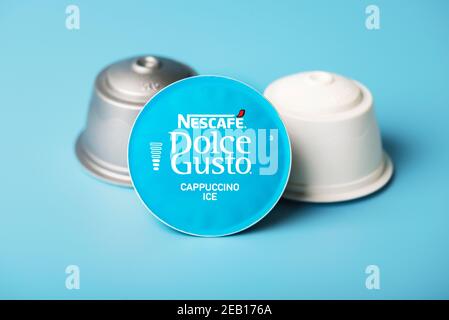 closeup of Nescafe Dolce Gusto capsule,cappuccino ice on blue  background.Selective focus Stock Photo - Alamy
