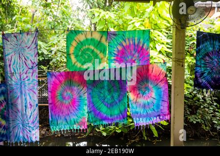 Colorful Garments with Random Designs Crafted by Tourists Stock Photo