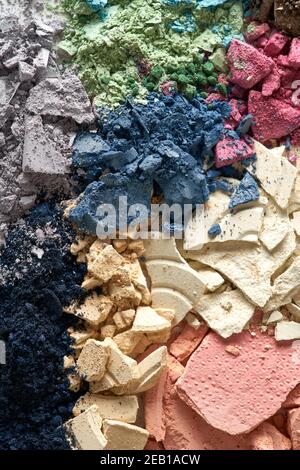 Broken eyeshadows in trendy shades isolated on white background Stock Photo