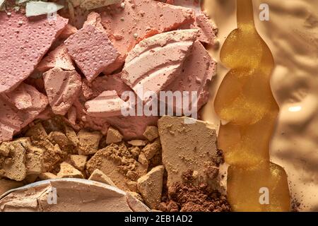 Broken eyeshadows in trendy shades isolated on white background Stock Photo