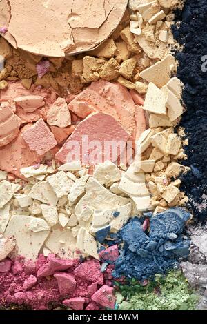 Broken eyeshadows in trendy shades isolated on white background Stock Photo