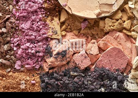 Broken eyeshadows in trendy shades isolated on white background Stock Photo