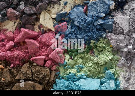 Broken eyeshadows in trendy shades isolated on white background Stock Photo