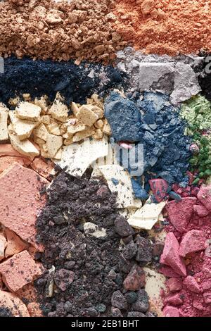 Broken eyeshadows in trendy shades isolated on white background Stock Photo