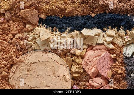 Broken eyeshadows in trendy shades isolated on white background Stock Photo