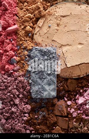 Broken eyeshadows in trendy shades isolated on white background Stock Photo