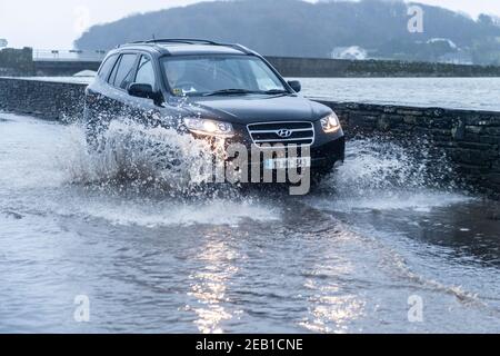 Timoleague, West Cork, Ireland. 11th Feb, 2021. After a day of torrential rain and winter showers, Timoleague flooded at high tide this evening. Credit: AG News/Alamy Live News Stock Photo