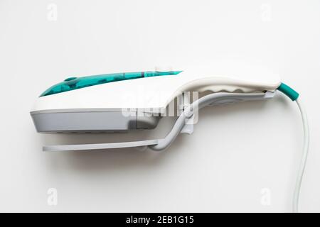 household steamer for ironing clothes isolated on white Stock Photo