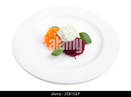 Vegetable salad with beetroot cheese. Isolated on a white background. Stock Photo