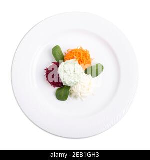 Vegetable salad with cheese. Isolated on a white background. Stock Photo