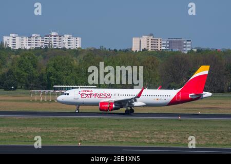 Berlin Germany - April 21. 2018: Iberia Express Airbus A320 plane landing at Berlin Tegel Airport Stock Photo