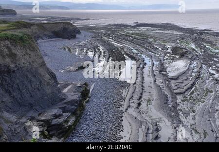 Limestone ridges which form the Bristol Channel beach at Kilve on the coast at the foot of the Quantock Hills in Somerset. Stock Photo