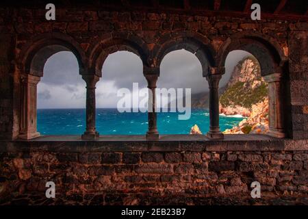 Columns of famous gothic Church of Staint Peter or Chiesa di San Pietro with beautiful scenery in Porto Venere village on the Ligurian coast of northw Stock Photo