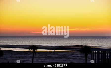 Early Morning Beach Walkers Stock Photo