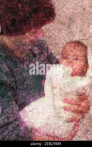 Austin, Texas USA: Mother wraps 4-month-old son in towel after bathing him. ©1994 Bob Daemmrich BAD3216F Stock Photo