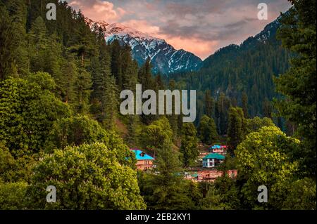 Scenic view in the Himalayan range. Sunrise view from the dense forest of Himalayan village Grahan, Kasol, Himachal Pradesh, India. Stock Photo