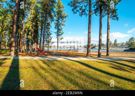 View from Q'emiln Park and beach along the Spokane River in the rural community of Post Falls, Idaho, USA Stock Photo