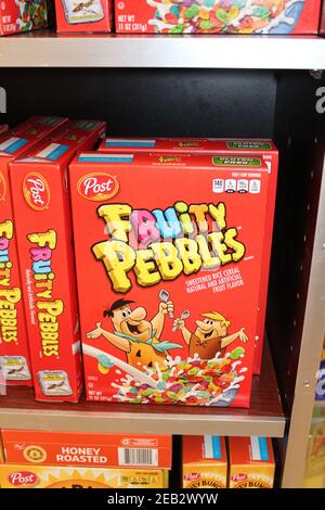 Post Fruity Pebbles shot closeup on a metal shelf that's bright and colorful at a grocery store in Kansas in a colorful box. Stock Photo