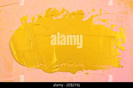 Gold element acrylic coating, painting plate-form like on pink matte canvas abstract texture background. Handmade, hand drawn. Stock Photo