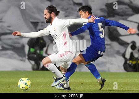 Real Madrid's Isco Alarcon (l) and Getafe CF's Take Kubo during La Liga match Real Madrid v Getafe on February 9, 2021 in Madrid, Spain. Photo by Acero/AlterPhotos/ABACAPRESS.COM Stock Photo