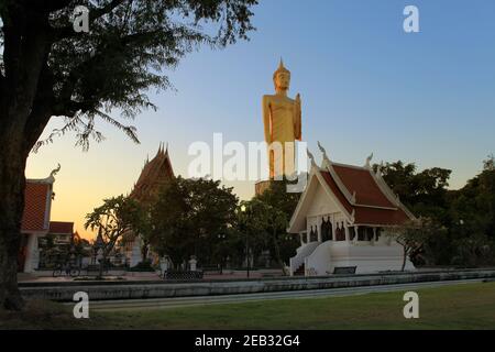 Burapha Phiram Temple and Big Buddha or Buddha Rattanamongkol Mahamuni The highest standing Buddha statue in Thailand In Roi Et Province. Stock Photo