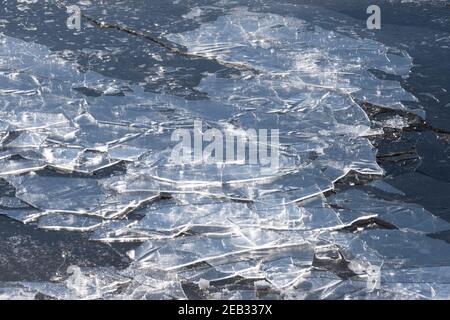 Floating, drifting or shelf ice on the coastline of the IJsselmeer in the Netherlands in winter Stock Photo