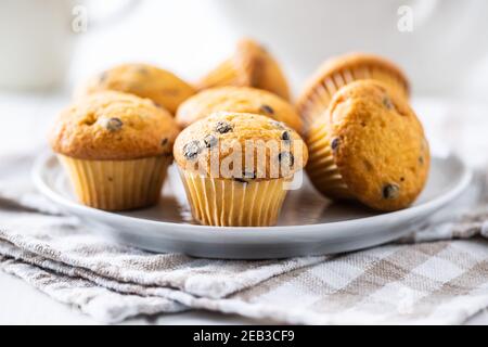 Vanilla muffins. Sweet cupcakes on plate. Stock Photo