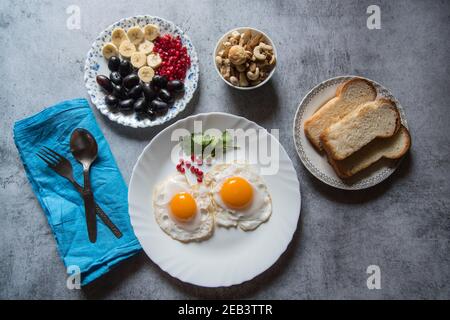 Healthy breakfast food ingredients on a background. Top view, selective focus. Stock Photo