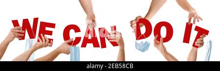 Hands holding red letters forming phrase we can do it with face masks hanging in hopes of fighting the virus with isolated white background Stock Photo