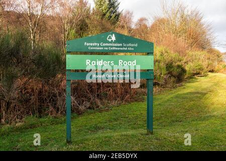 Mossdale, Scotland - December 21st 2020: Raiders Road forestry sign in the Galloway Forestry Park, Mossdale, Scotland Stock Photo
